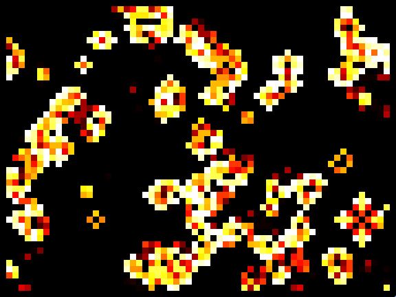 Conways Game of Life: Zellhaufen in Gelb, Orange und Weiß auf Schwarz.