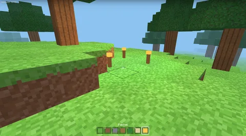 Eine Blockwelt mit Bäumen auf grüner Wiese, unten eine Leiste mit Blöcken zum Bauen