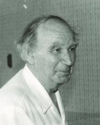 Schwarzweißfoto von Jewgeni Landis 1987: ein älterer Mann mit zurückgekämmtem Haar im Profil.
